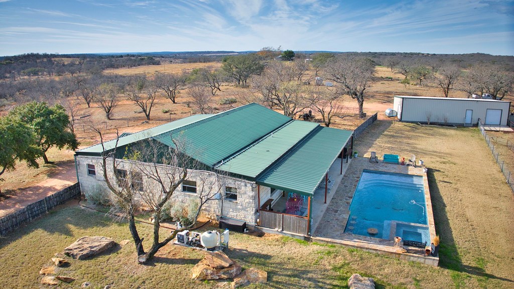 6446 Blackjack Road Fredonia, TX 76842 - Photo 13 of 52 a view of a backyard with sitting area