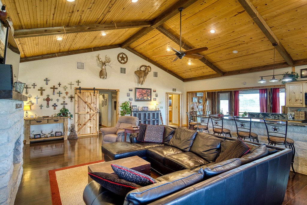 6446 Blackjack Road Fredonia, TX 76842 - Photo 24 of 52 a living room with furniture and a flat screen tv