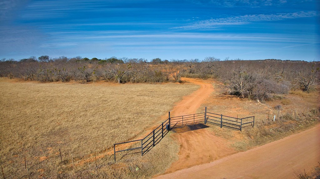 6446 Blackjack Road Fredonia, TX 76842 - Photo 6 of 52 a view of a lake and mountain