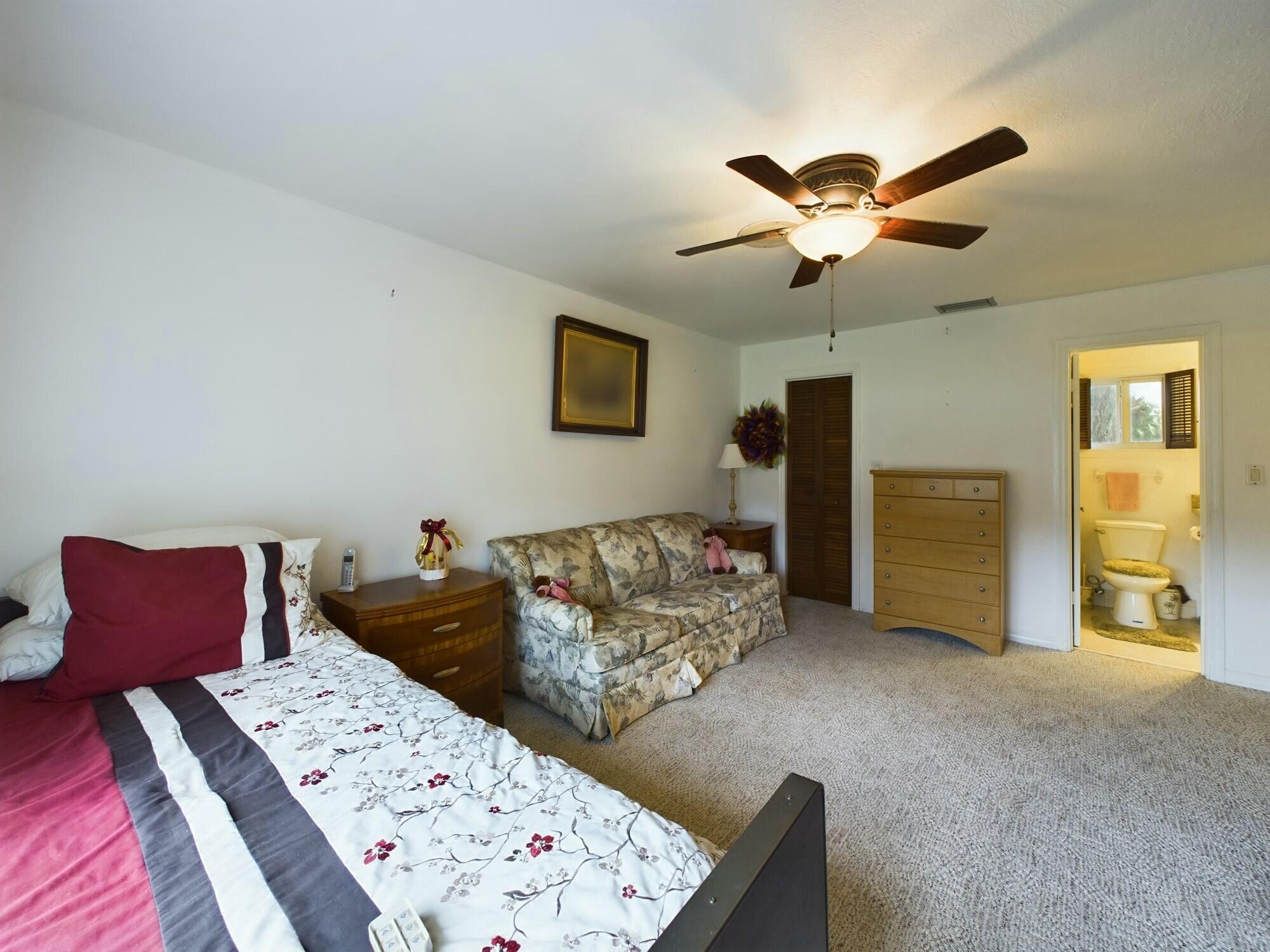 1517 Southwest 7th Avenue Okeechobee, FL 34974 - Photo 20 of 51 a living room with furniture and a couch