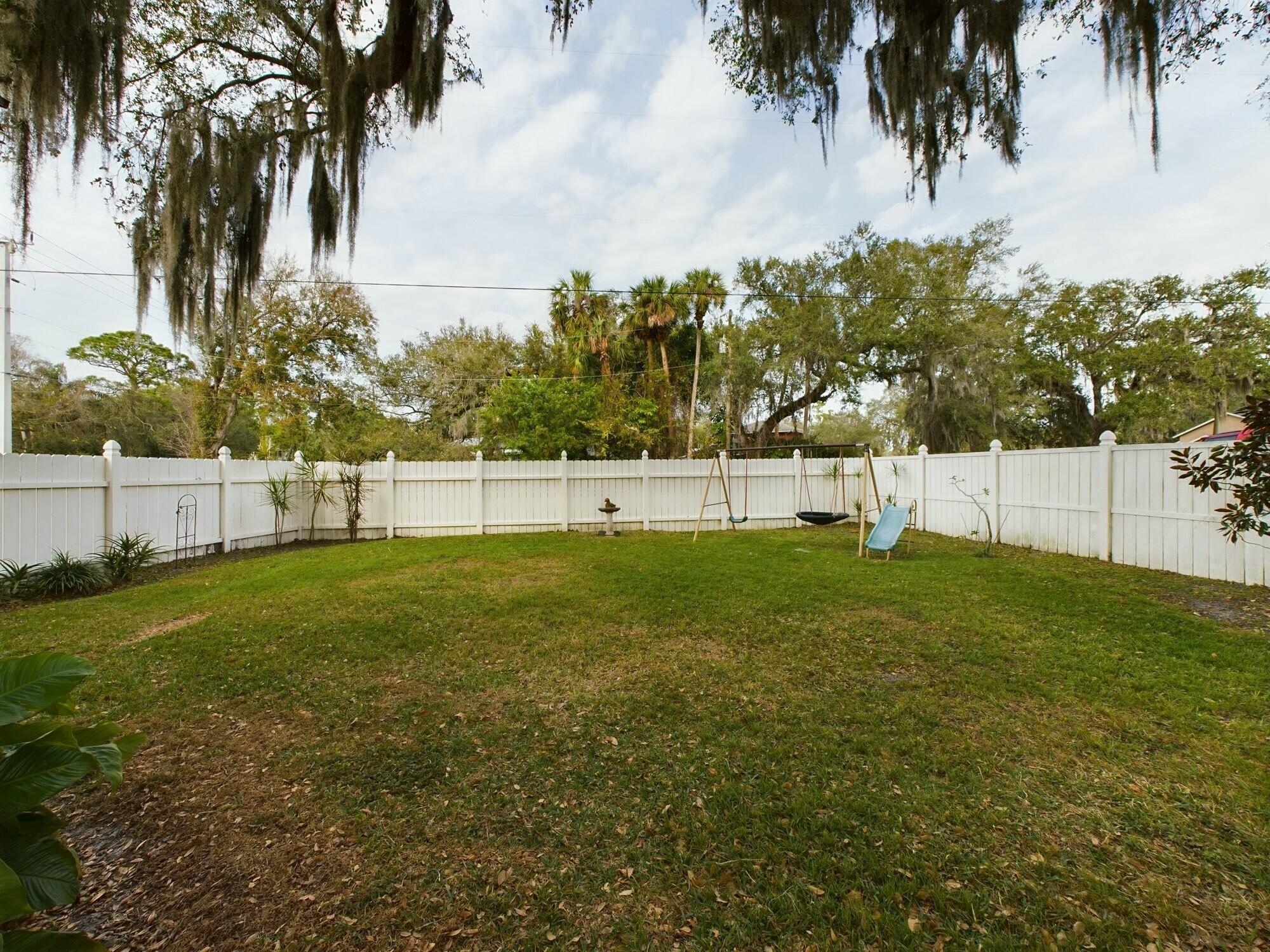 1517 Southwest 7th Avenue Okeechobee, FL 34974 - Photo 43 of 51 a view of yard with grass and trees
