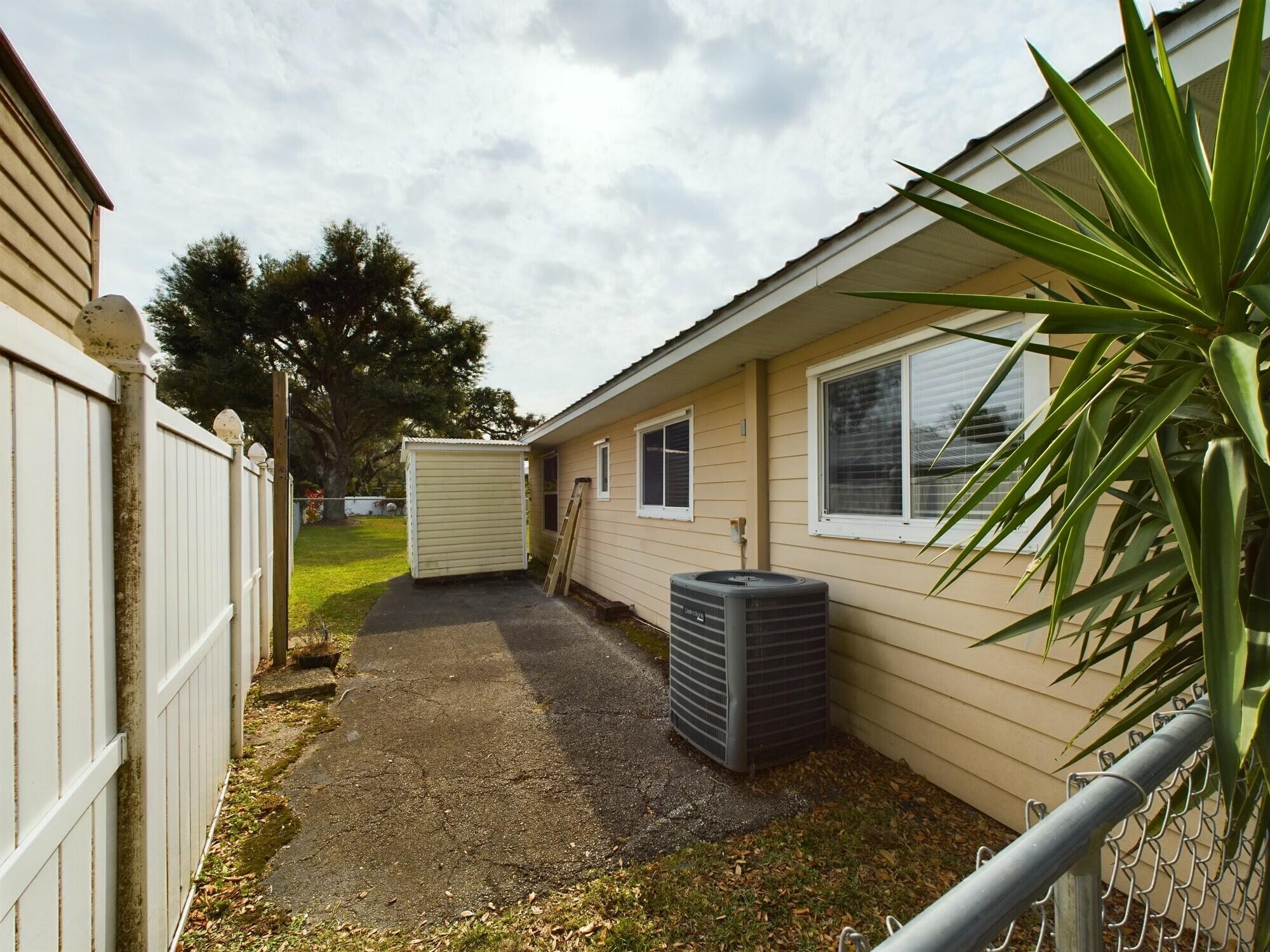 1517 Southwest 7th Avenue Okeechobee, FL 34974 - Photo 46 of 51 a view of a house with a backyard