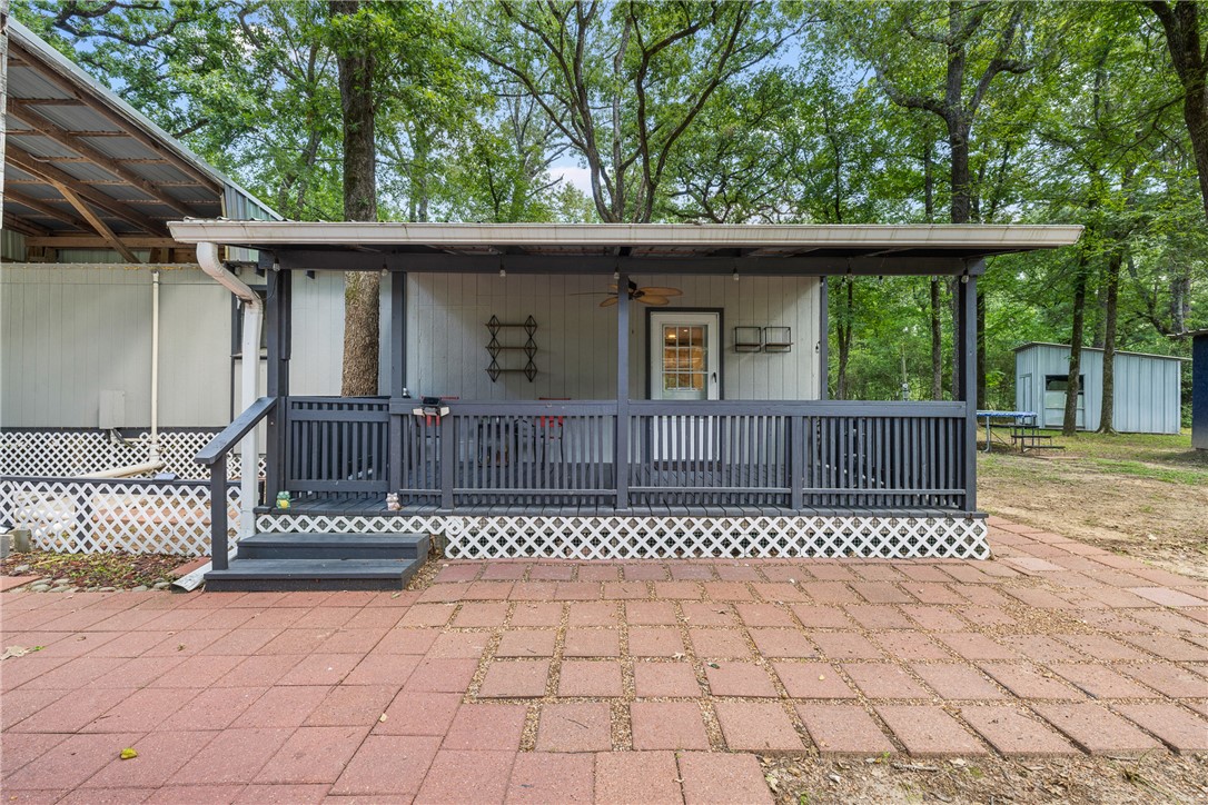 12255 County Road Centerville, TX 75833 - Photo 7 of 26 a front view of a house with a porch