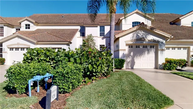 front view of a house with a small yard