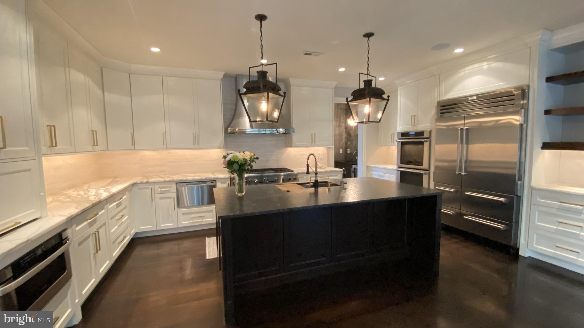 206 Valley Ridge Road Haverford, PA 19041 - Photo 12 of 48 a kitchen with counter top space cabinets and appliances