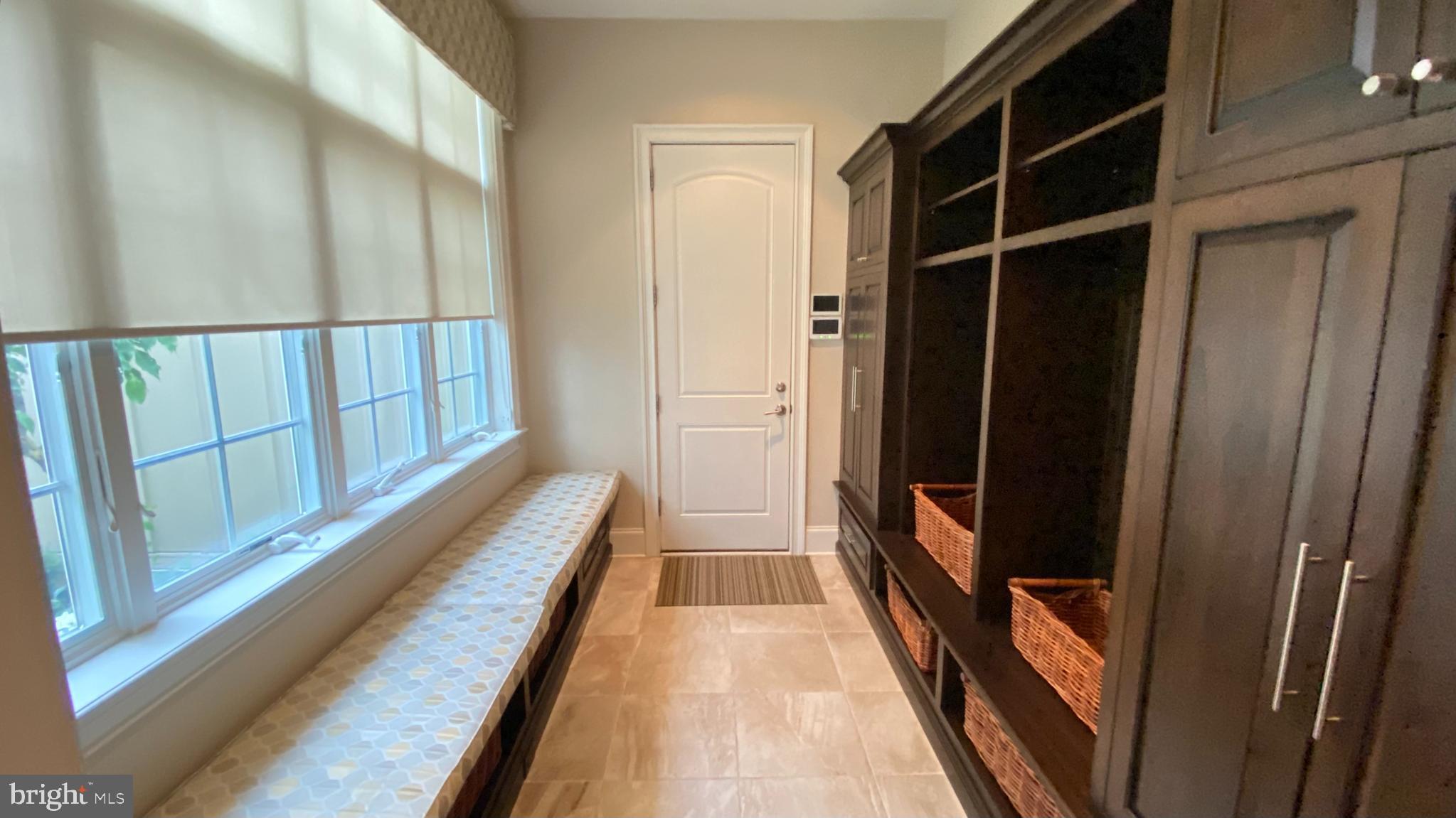 206 Valley Ridge Road Haverford, PA 19041 - Photo 19 of 48 a view of a hallway with wooden floor and staircase