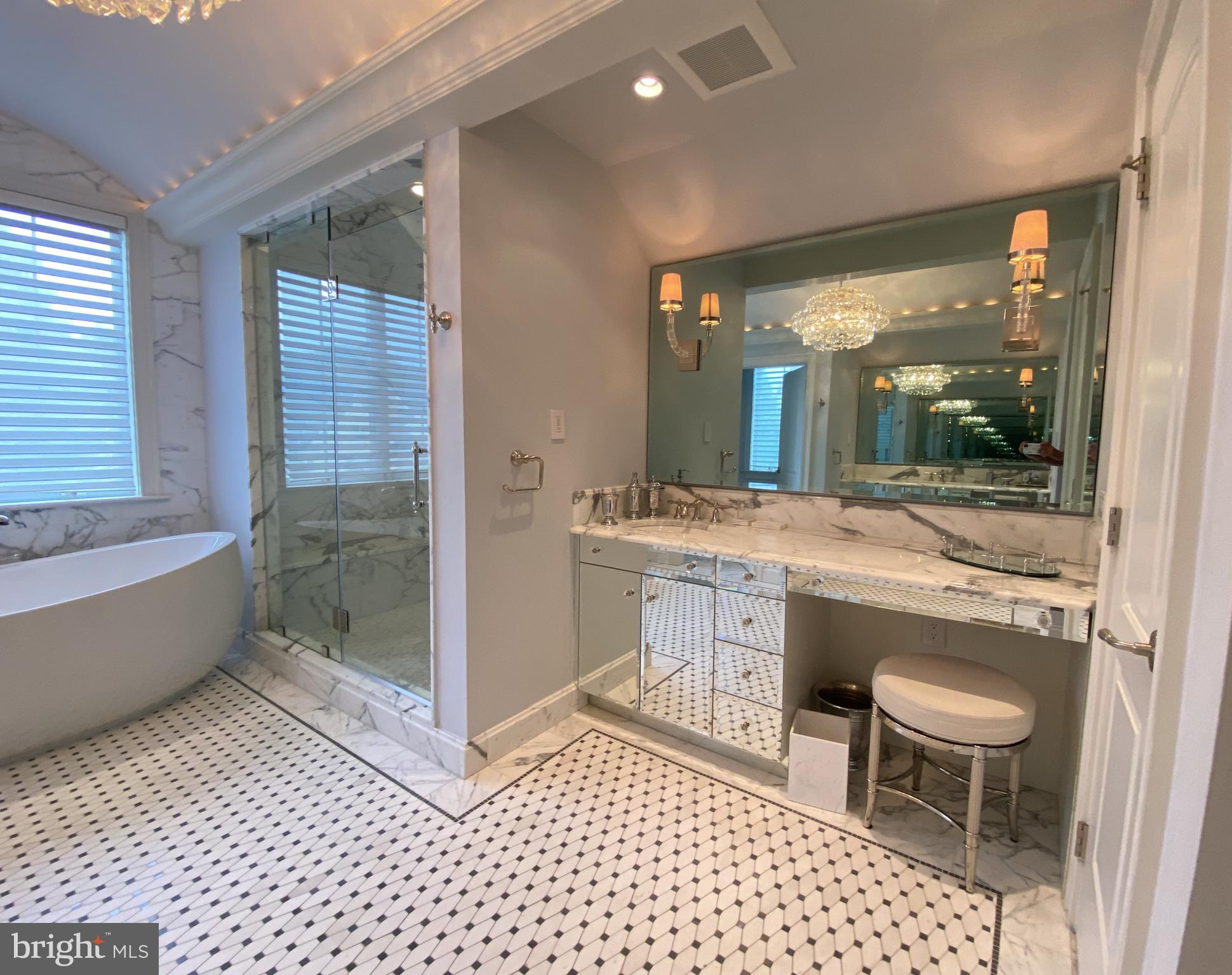 206 Valley Ridge Road Haverford, PA 19041 - Photo 27 of 48 a bathroom with a sink a toilet a mirror and shower