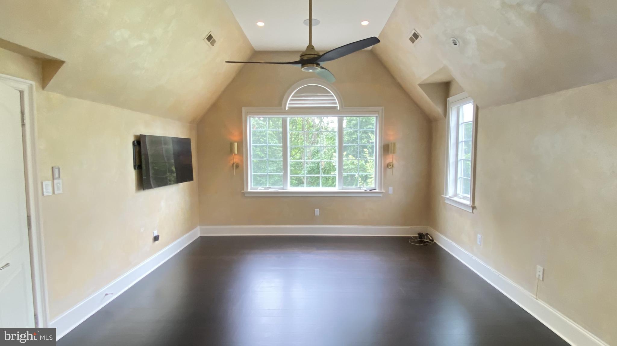 206 Valley Ridge Road Haverford, PA 19041 - Photo 29 of 48 a view of an empty room with wooden floor and a window