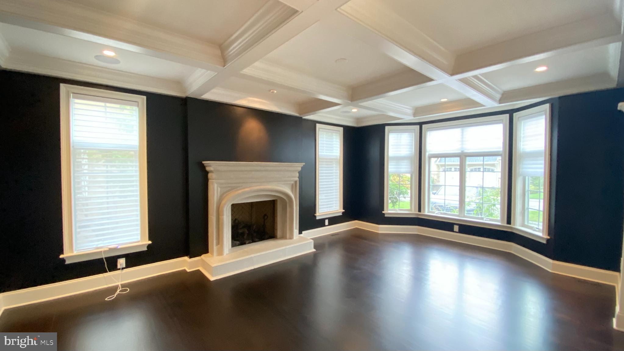 206 Valley Ridge Road Haverford, PA 19041 - Photo 8 of 48 a view of an empty room with wooden floor and a window