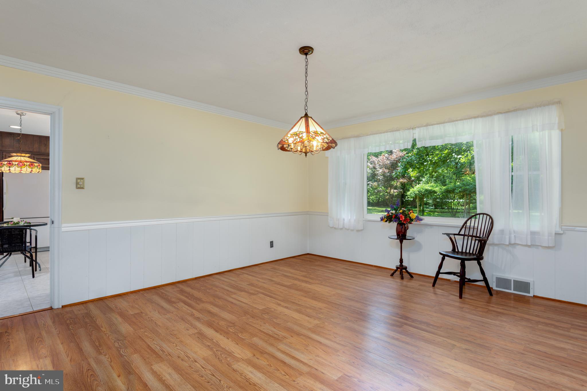 320 Pine Road Carlisle, PA 17015 - Photo 24 of 95 Large DR with view of creek and flowering beds