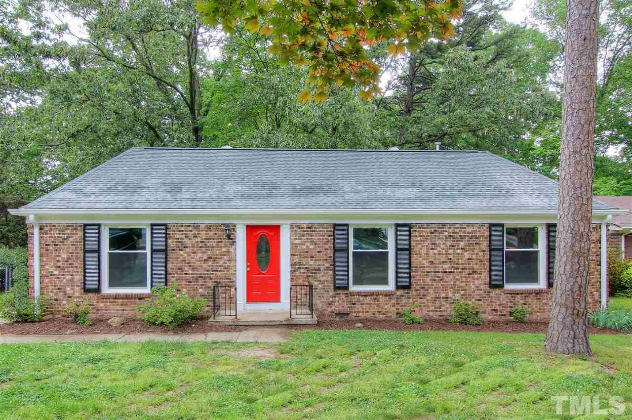 4608 Huntington Court Raleigh, NC 27609 - Photo 1 of 10 front view of a house with a yard