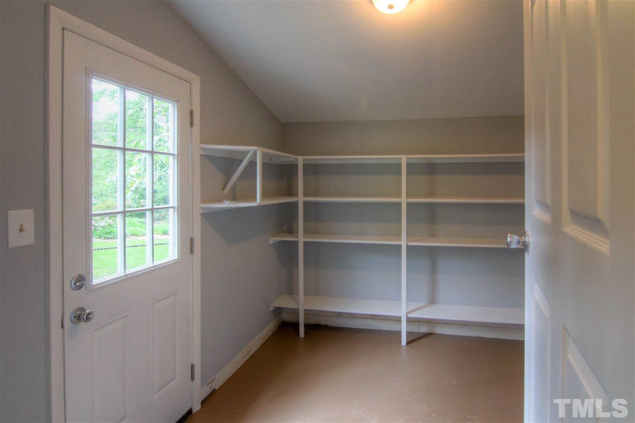 4608 Huntington Court Raleigh, NC 27609 - Photo 8 of 10 a view of an empty room with a window