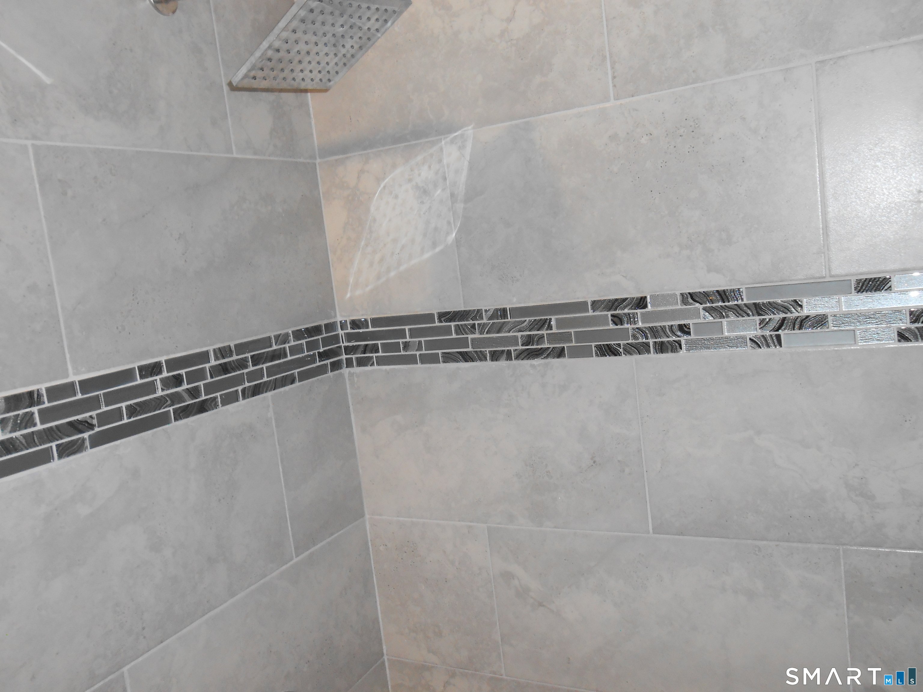 254 Wayne Street Bridgeport, CT 06606 - Photo 11 of 25 a close view of a shower in a bathroom