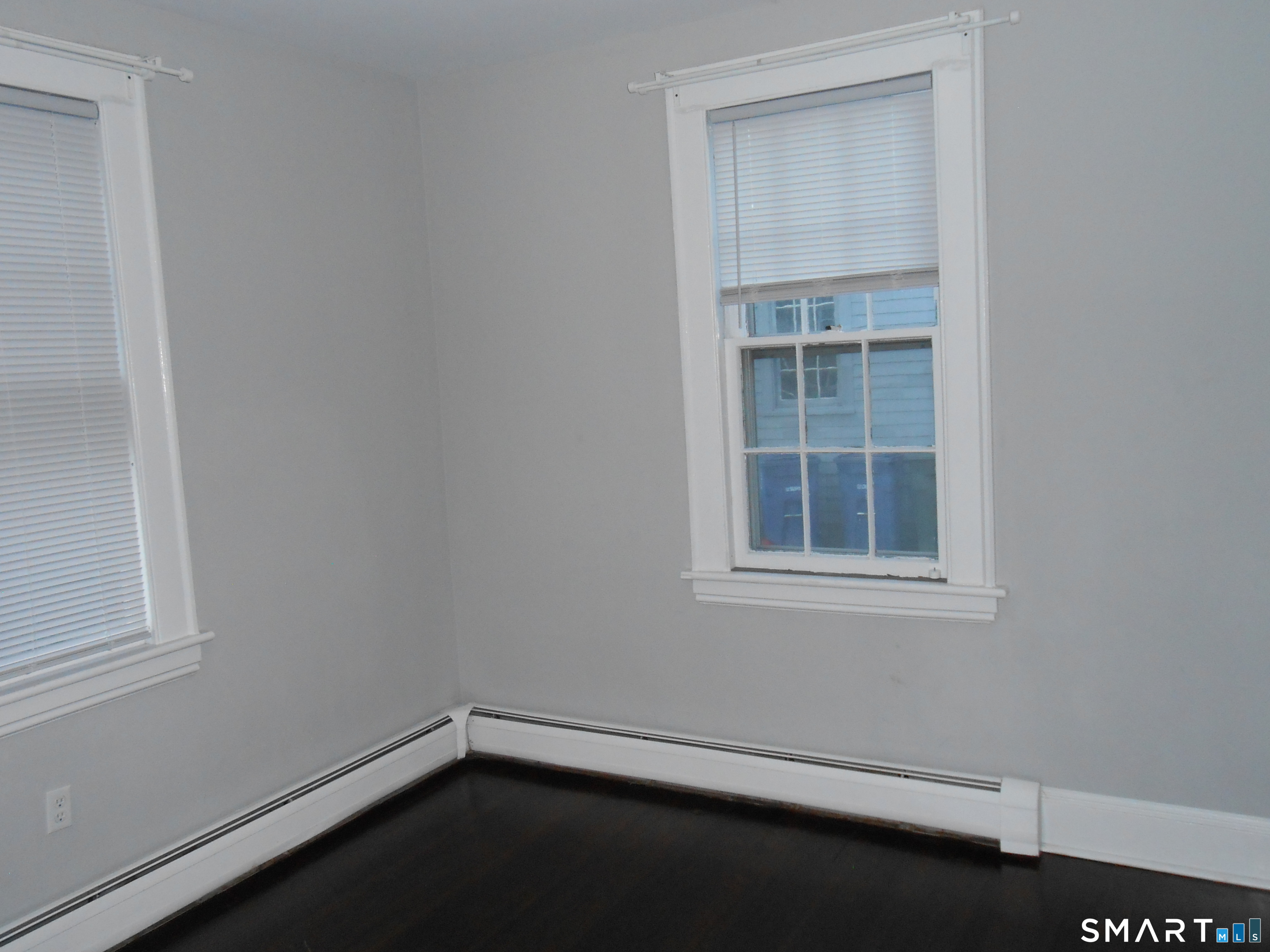 254 Wayne Street Bridgeport, CT 06606 - Photo 8 of 25 an empty room with a window
