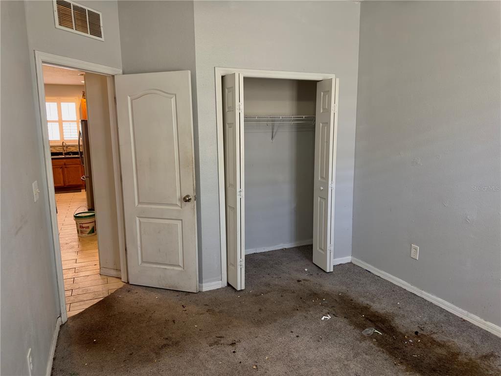 403 Thicket Crest Road Seffner, FL 33584 - Photo 18 of 28 an empty room with windows