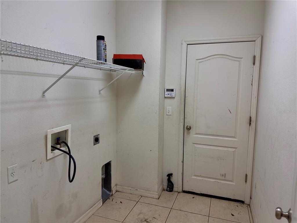 403 Thicket Crest Road Seffner, FL 33584 - Photo 28 of 28 a bathroom with a shower