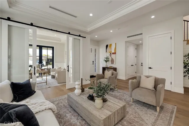 a view of staircase with wooden floor and a potted plant