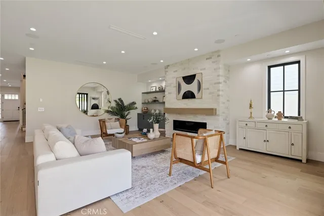 a bathroom with a white tub and shower