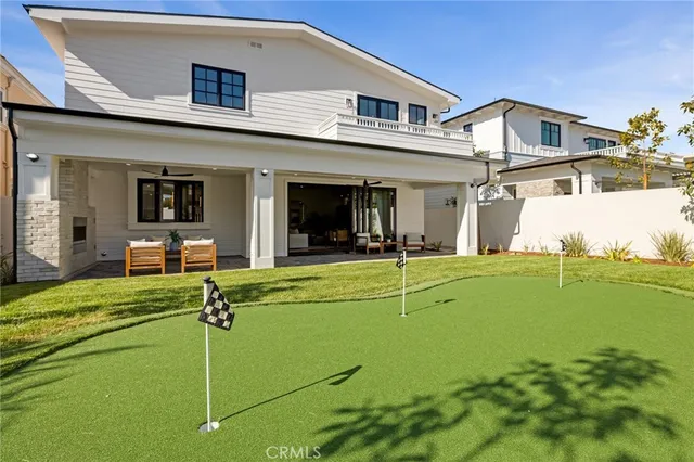 a bedroom with a large bed and a couch