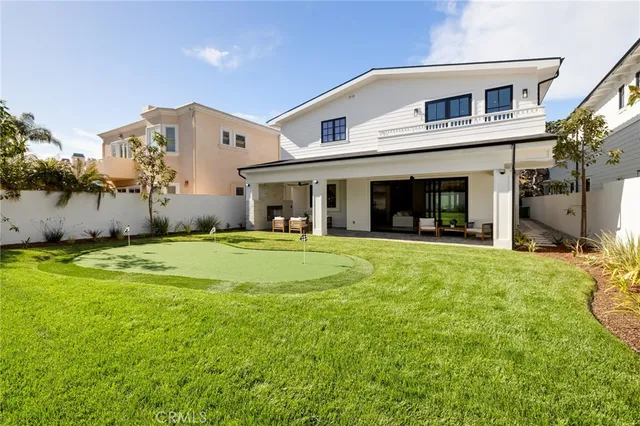 a bathroom with a double vanity sink mirror and shower