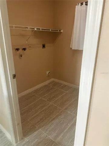 a view of a room with racks on the wall