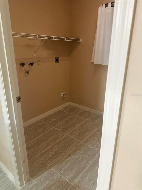 20 Cedar Road Ocala, FL 34472 - Photo 21 of 28 a view of a room with racks on the wall