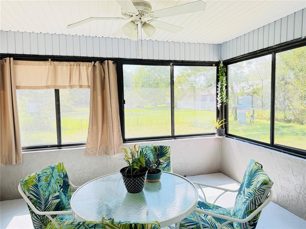 20 Cedar Road Ocala, FL 34472 - Photo 25 of 28 a dining room with furniture window and outside view
