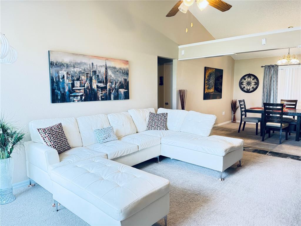 20 Cedar Road Ocala, FL 34472 - Photo 3 of 28 a living room with furniture and a large window