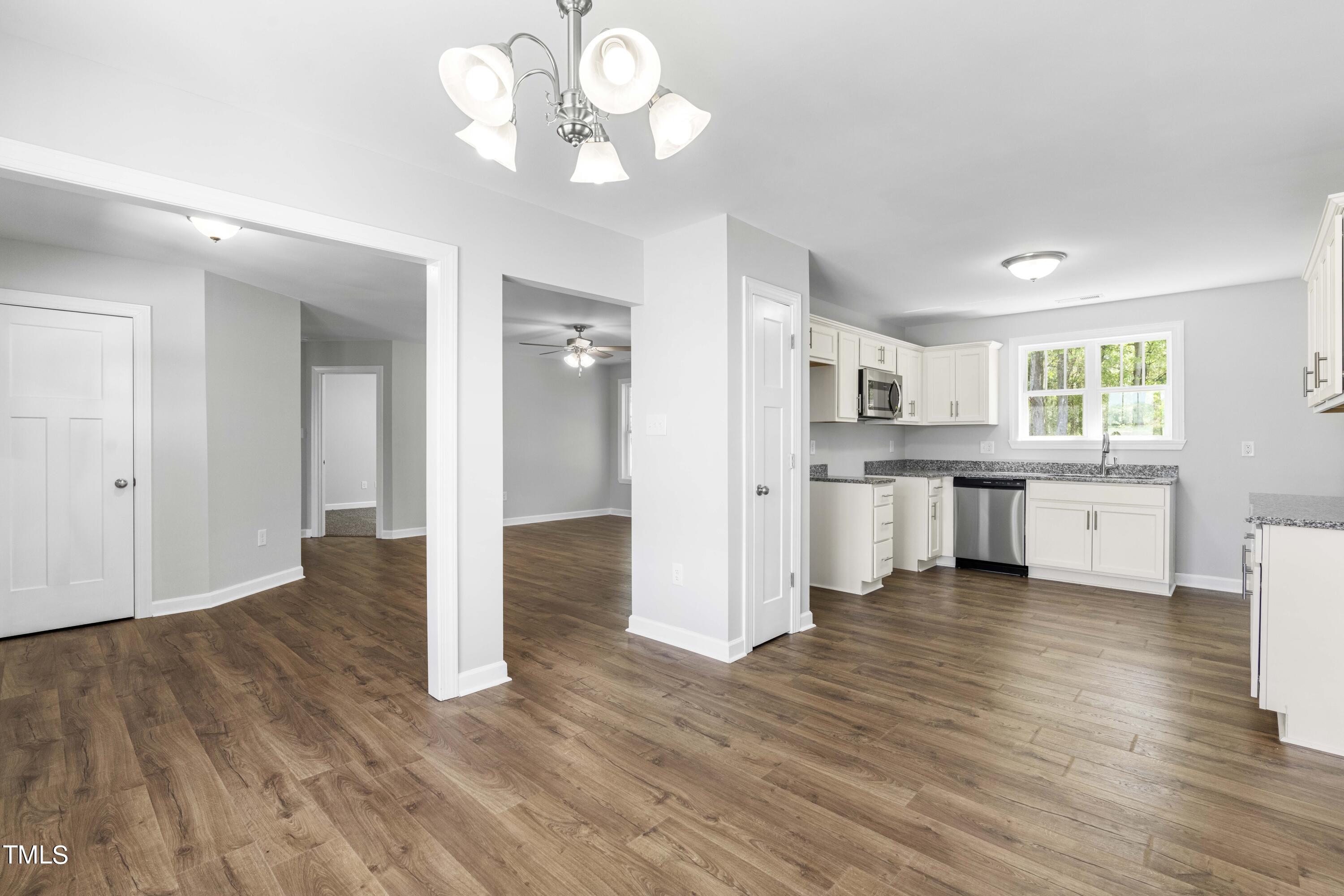 291 Wiggs Road Selma, NC 27576 - Photo 7 of 21 Dining, Kitchen & Living Room