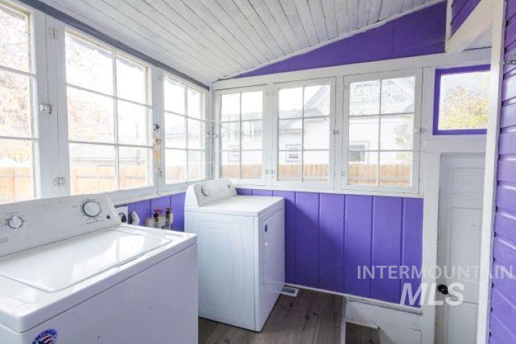 622 West Commercial Street Weiser, ID 83672 - Photo 17 of 21 Laundry room with dark wood finished floors, lofted ceiling, independent washer and dryer, wooden ceiling, and a sunroom