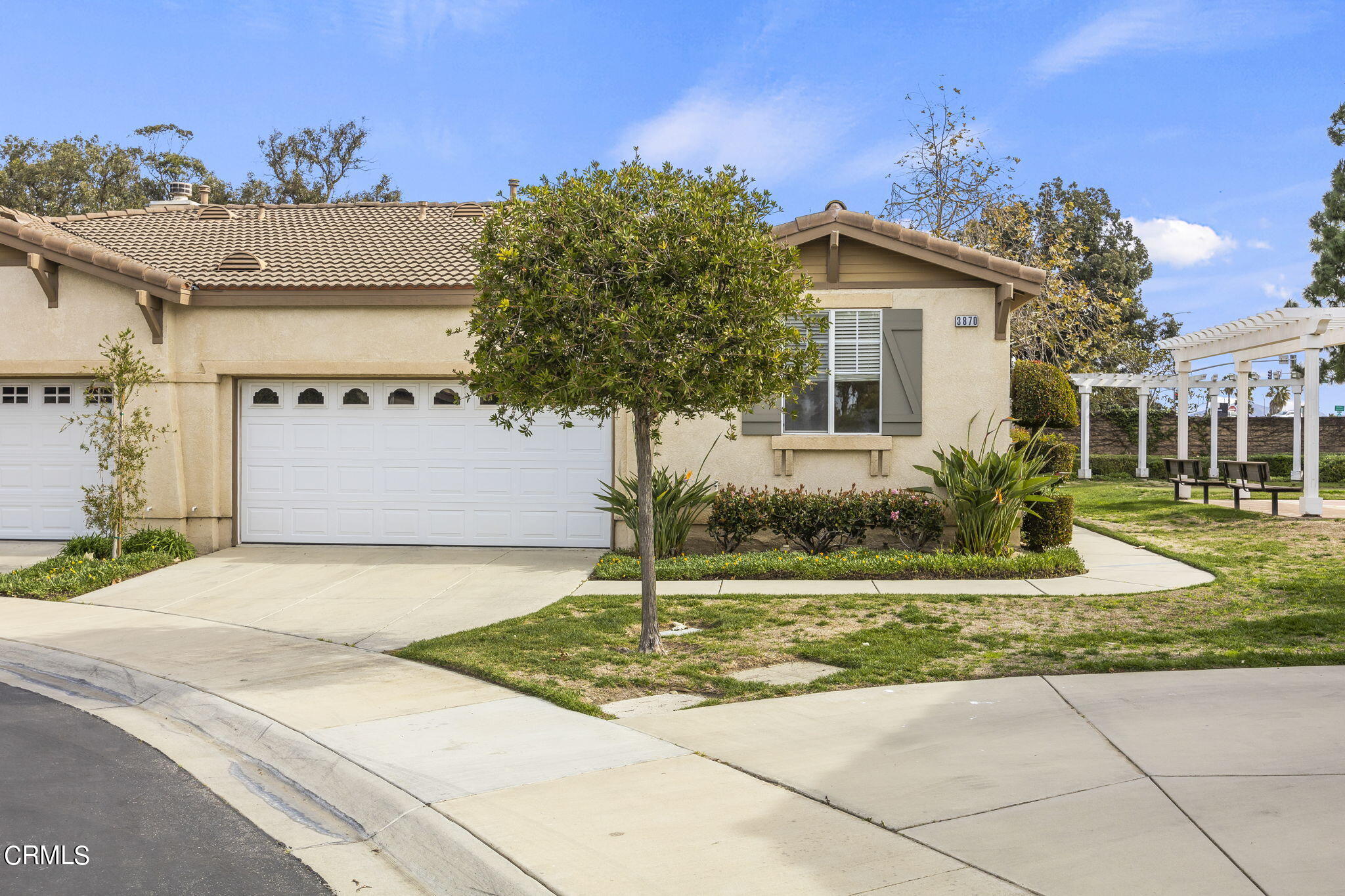 3870 Shakespeare Drive Oxnard, CA 93033 - Photo 1 of 29 a front view of a house with a yard