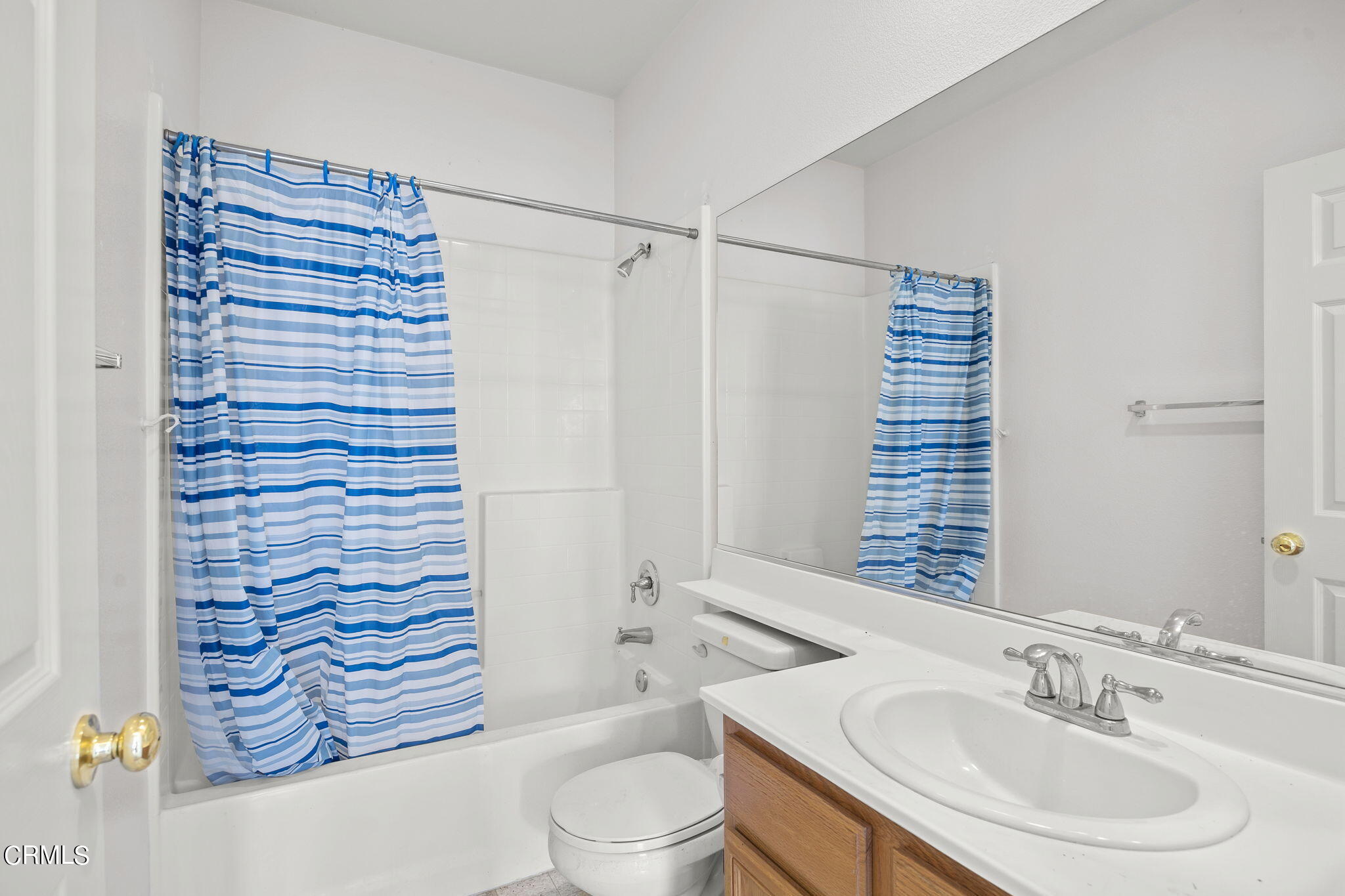 3870 Shakespeare Drive Oxnard, CA 93033 - Photo 18 of 29 a bathroom with a sink toilet and shower