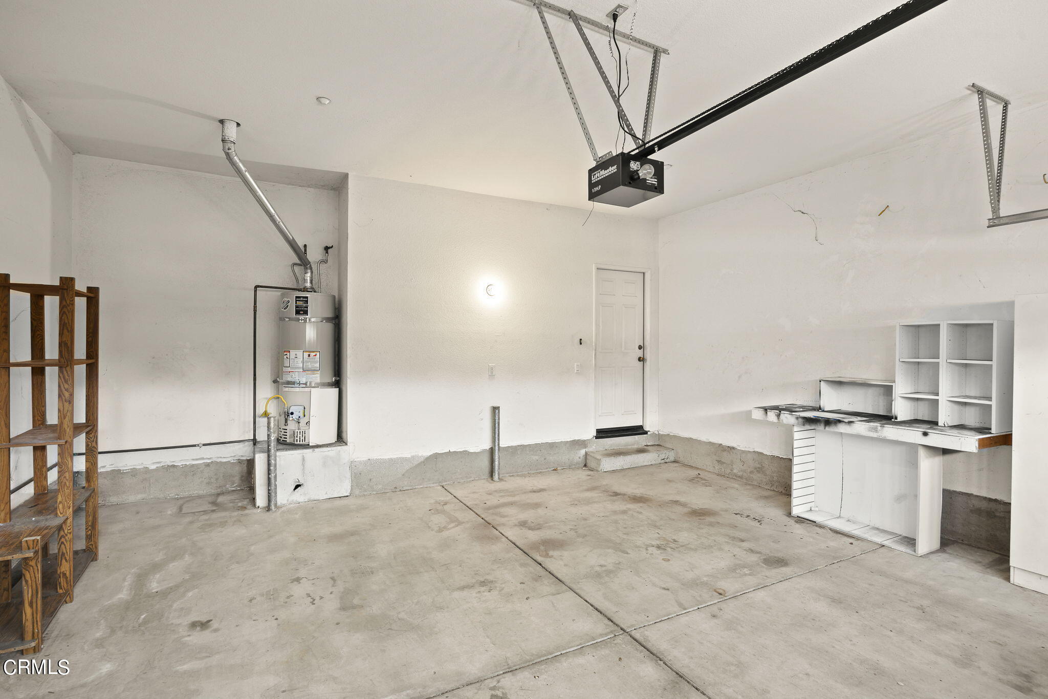 3870 Shakespeare Drive Oxnard, CA 93033 - Photo 25 of 29 a view of a kitchen with a stove cabinets and a refrigerator