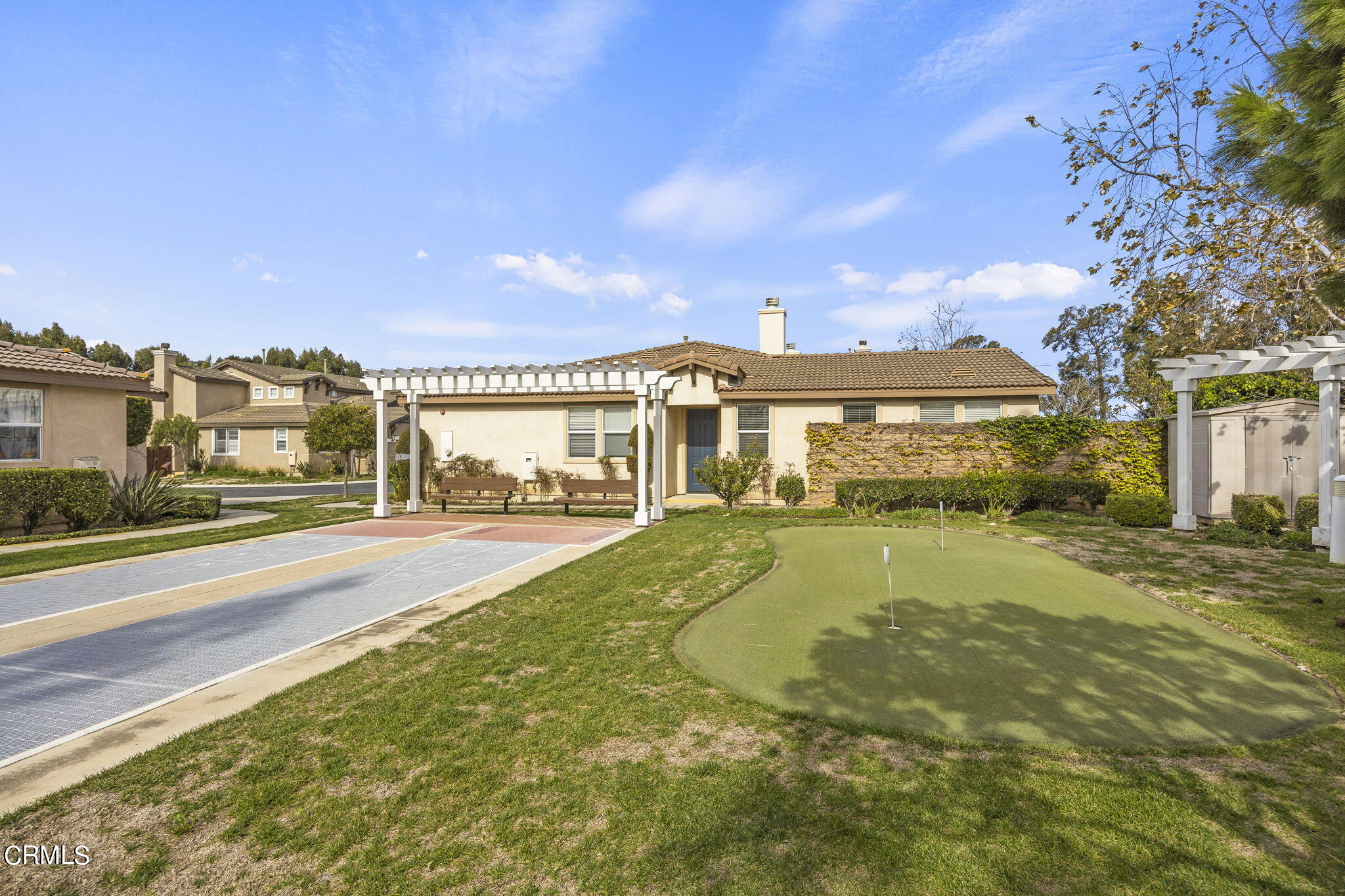 3870 Shakespeare Drive Oxnard, CA 93033 - Photo 26 of 29 a view of a house with a swimming pool