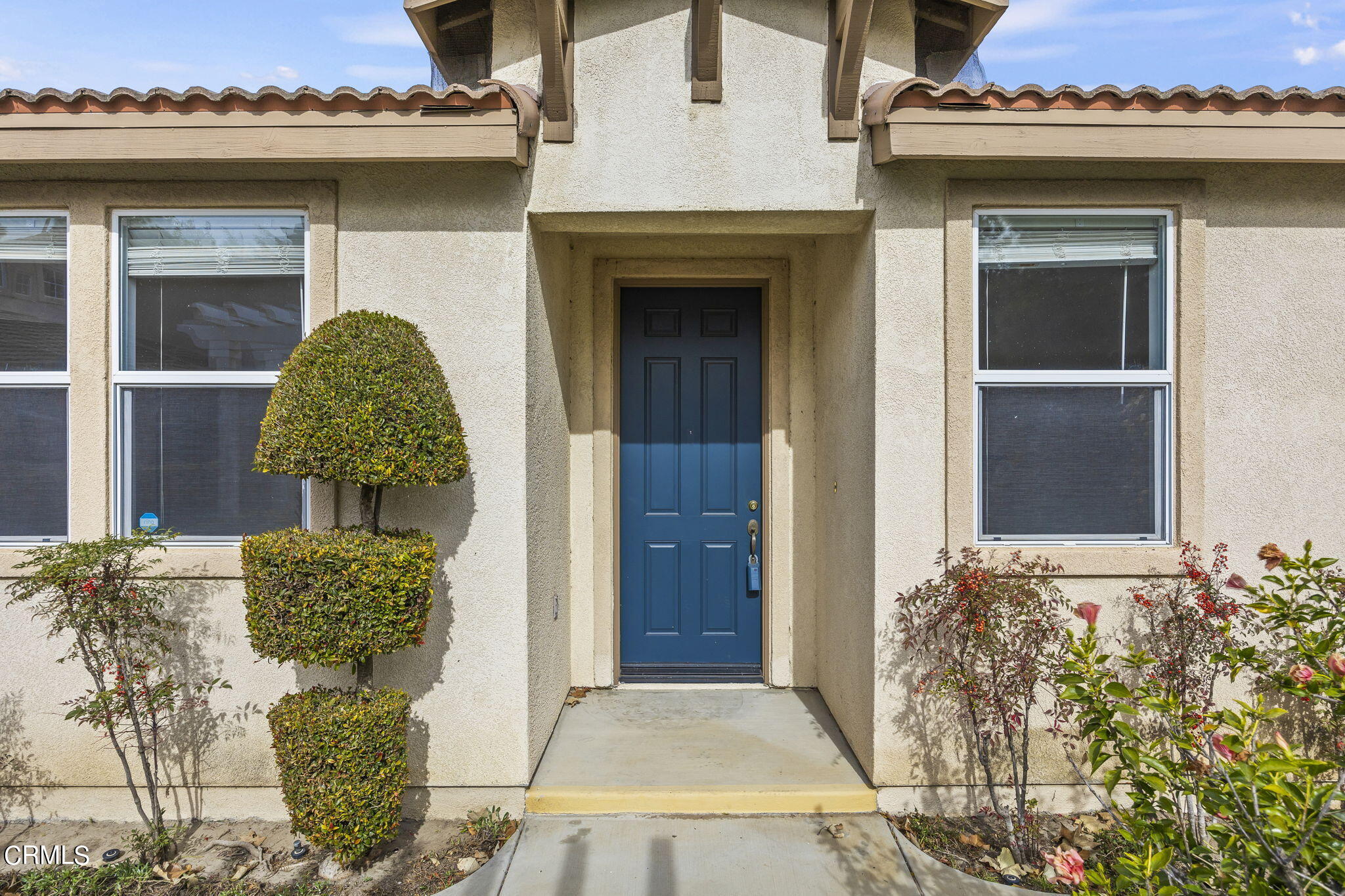 3870 Shakespeare Drive Oxnard, CA 93033 - Photo 4 of 29 front view of a house with a potted plant