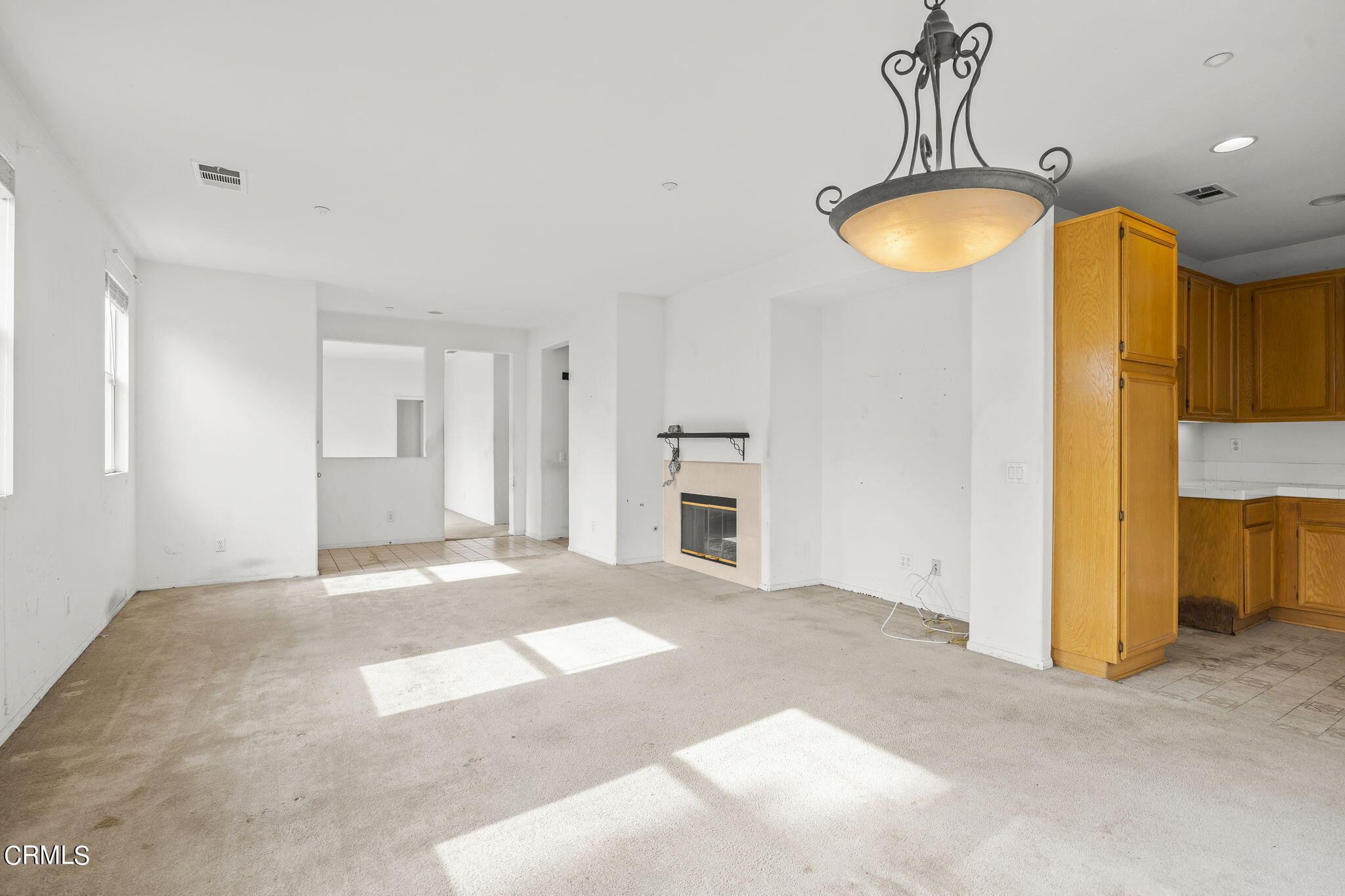 3870 Shakespeare Drive Oxnard, CA 93033 - Photo 6 of 29 a view of a kitchen with a sink and a refrigerator