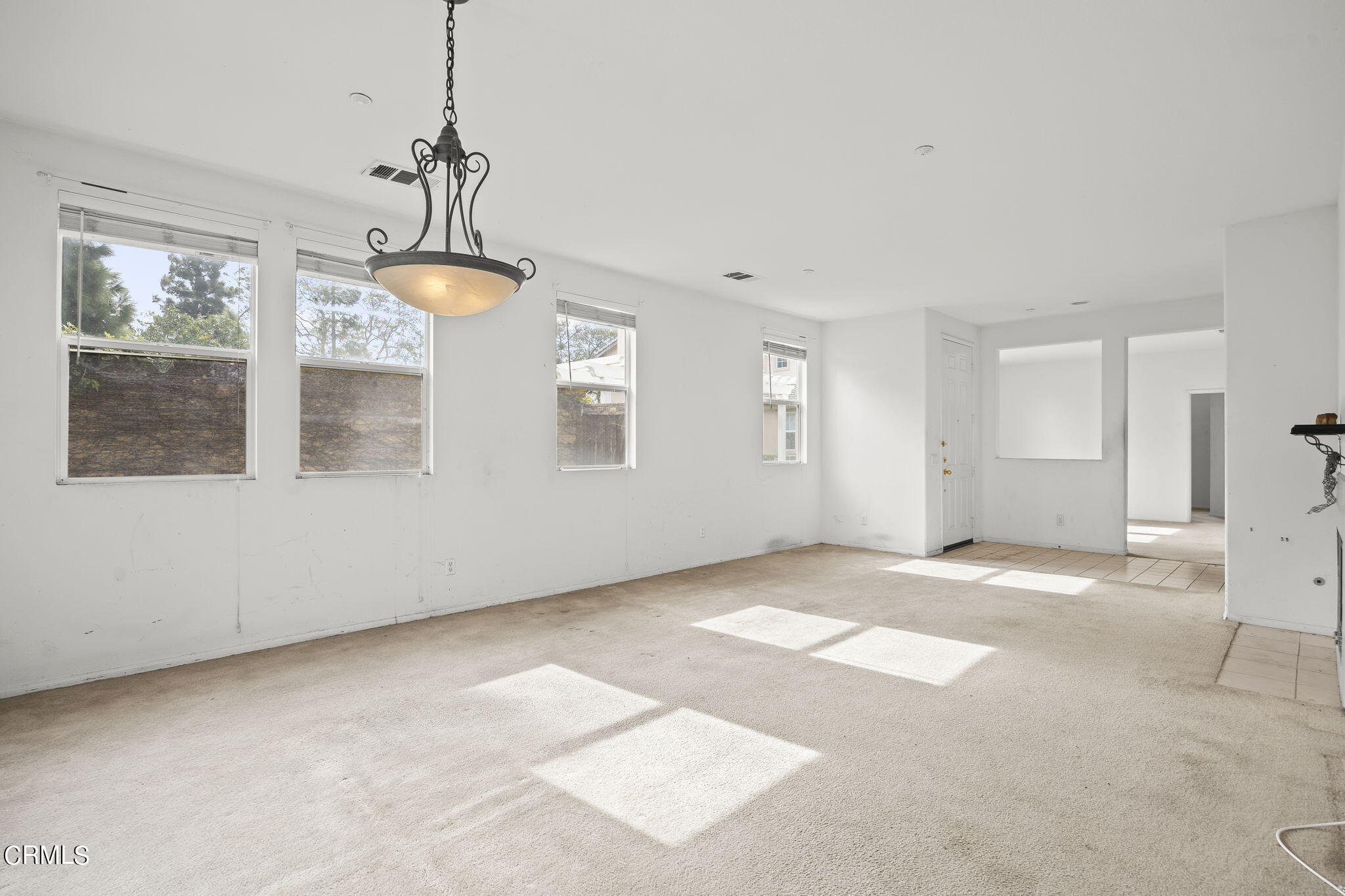 3870 Shakespeare Drive Oxnard, CA 93033 - Photo 8 of 29 a view of an empty room with a window