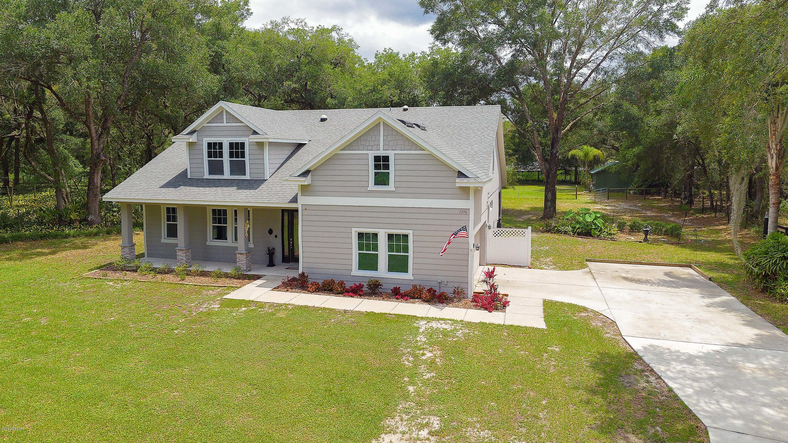 1378 Spring Garden Ranch Road De Leon Springs, FL 32130 - Photo 1 of 71 Front