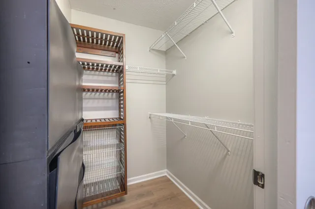 a view of a hallway with an entryway