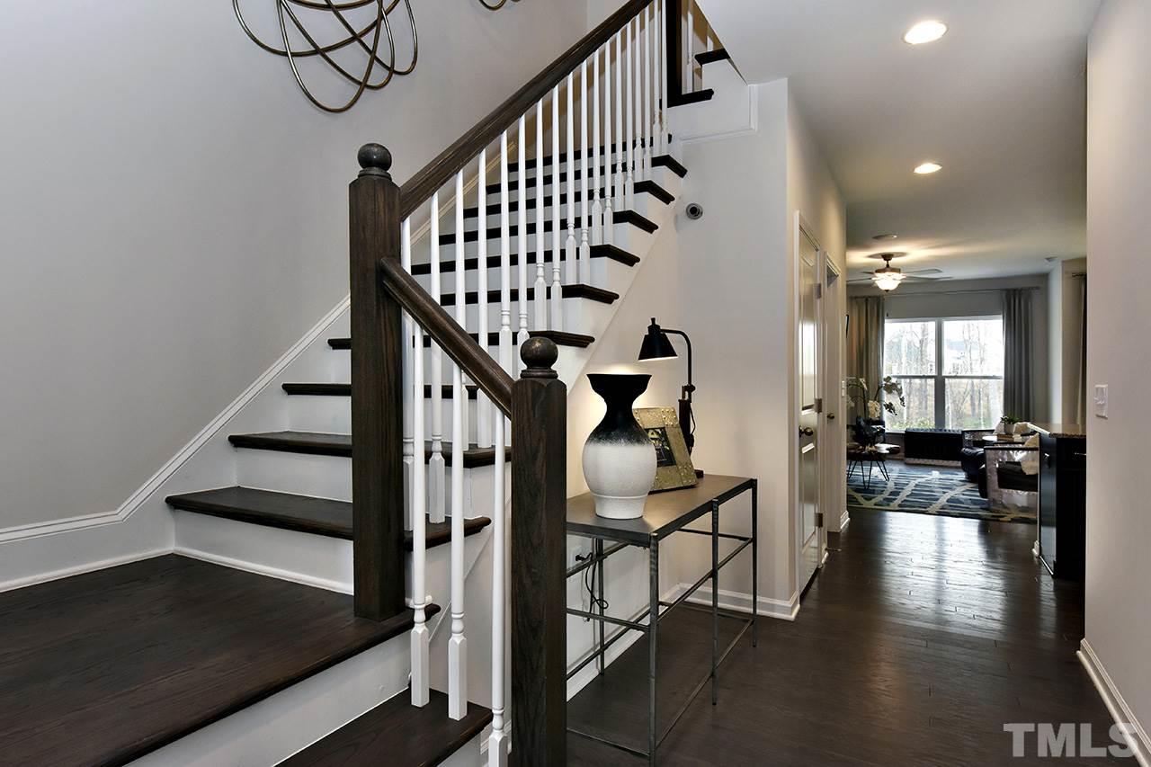 2567 Rambling Creek Road, Unit HOMESITE 14 Apex, NC 27523 - Photo 2 of 19 Photo is of Decorated Model Home at Woodcreek.