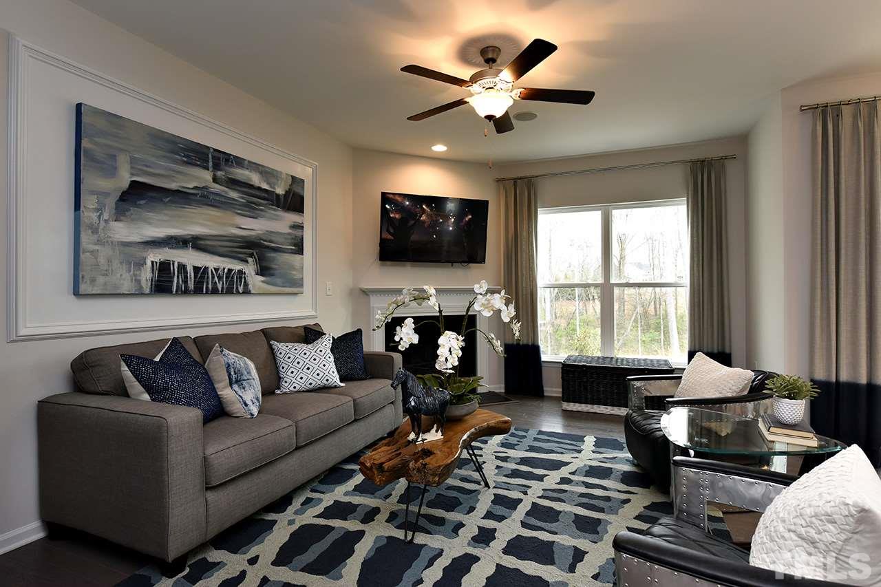 2567 Rambling Creek Road, Unit HOMESITE 14 Apex, NC 27523 - Photo 11 of 19 Photo is of Decorated Model Home at Woodcreek. Subject home does not have fireplace.