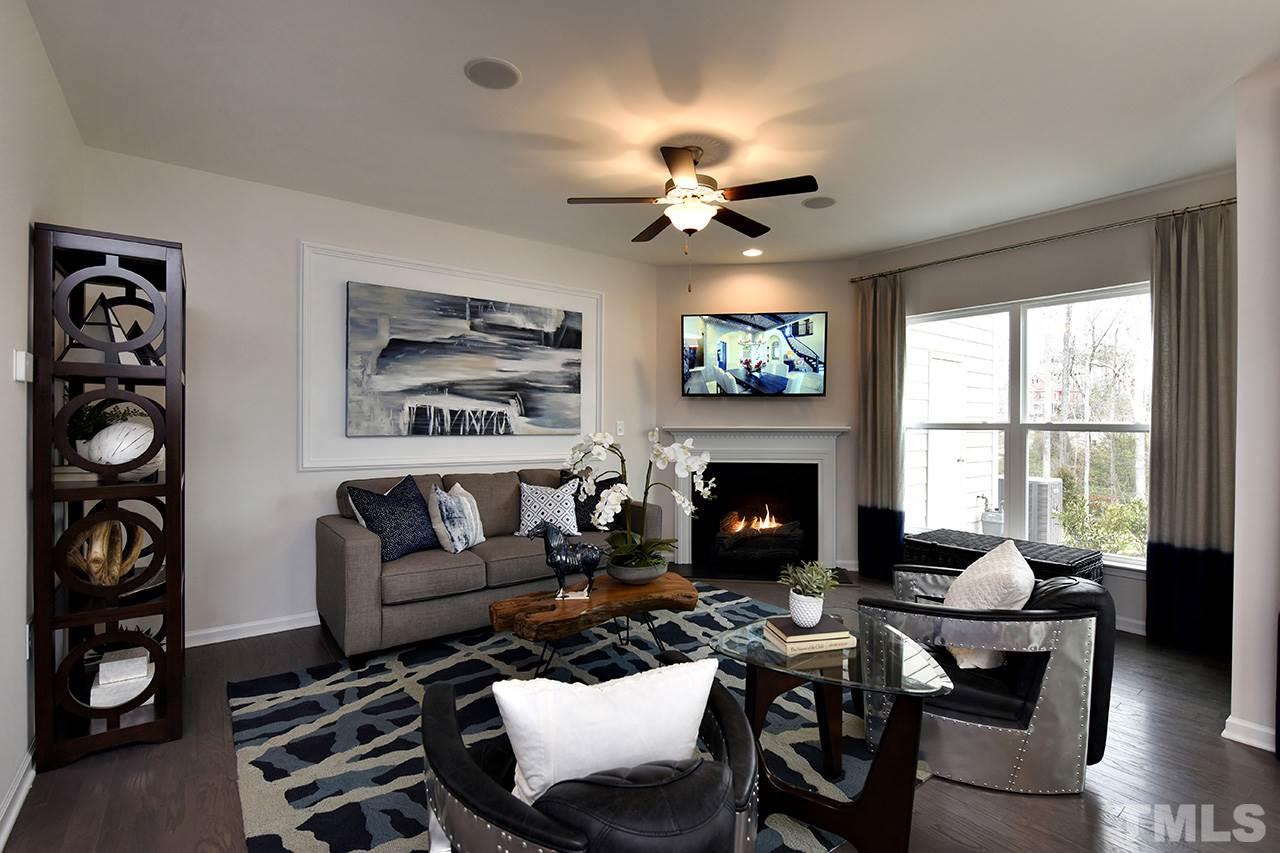 2567 Rambling Creek Road, Unit HOMESITE 14 Apex, NC 27523 - Photo 12 of 19 Photo is of Decorated Model Home at Woodcreek. Subject home does not have fireplace.
