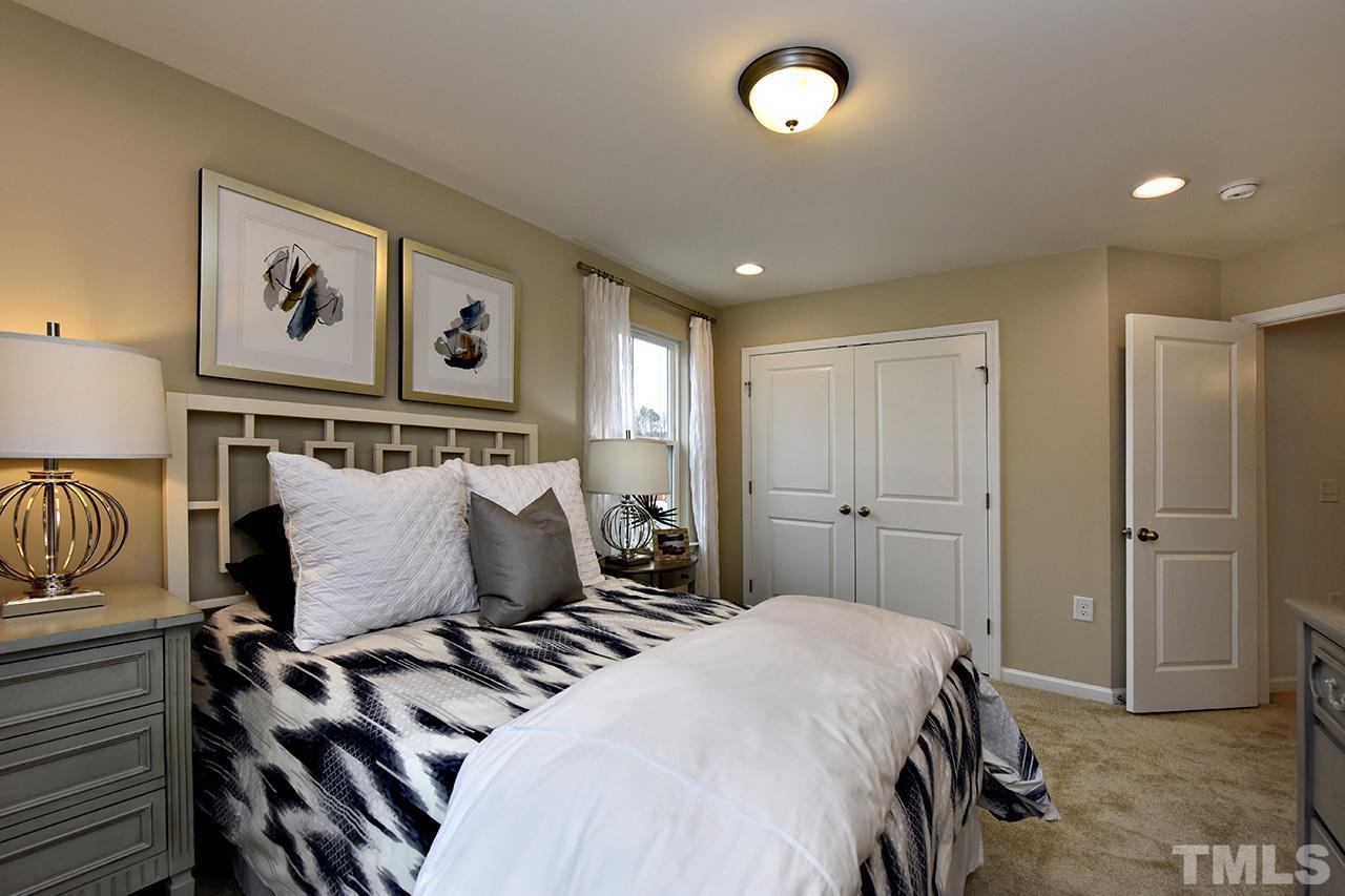 2567 Rambling Creek Road, Unit HOMESITE 14 Apex, NC 27523 - Photo 15 of 19 Photo is of Decorated Model Home at Woodcreek.