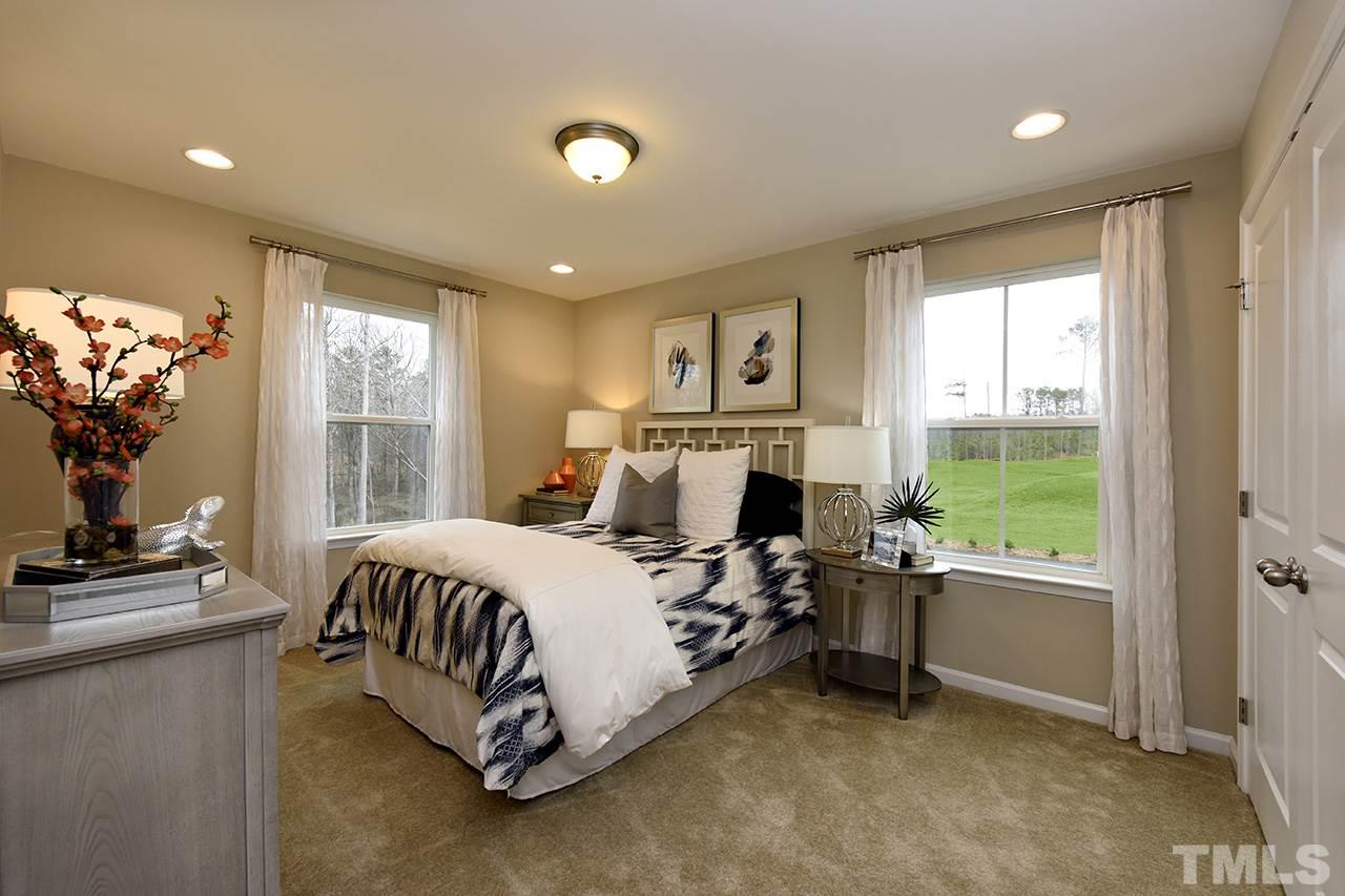 2567 Rambling Creek Road, Unit HOMESITE 14 Apex, NC 27523 - Photo 16 of 19 Photo is of Decorated Model Home at Woodcreek.