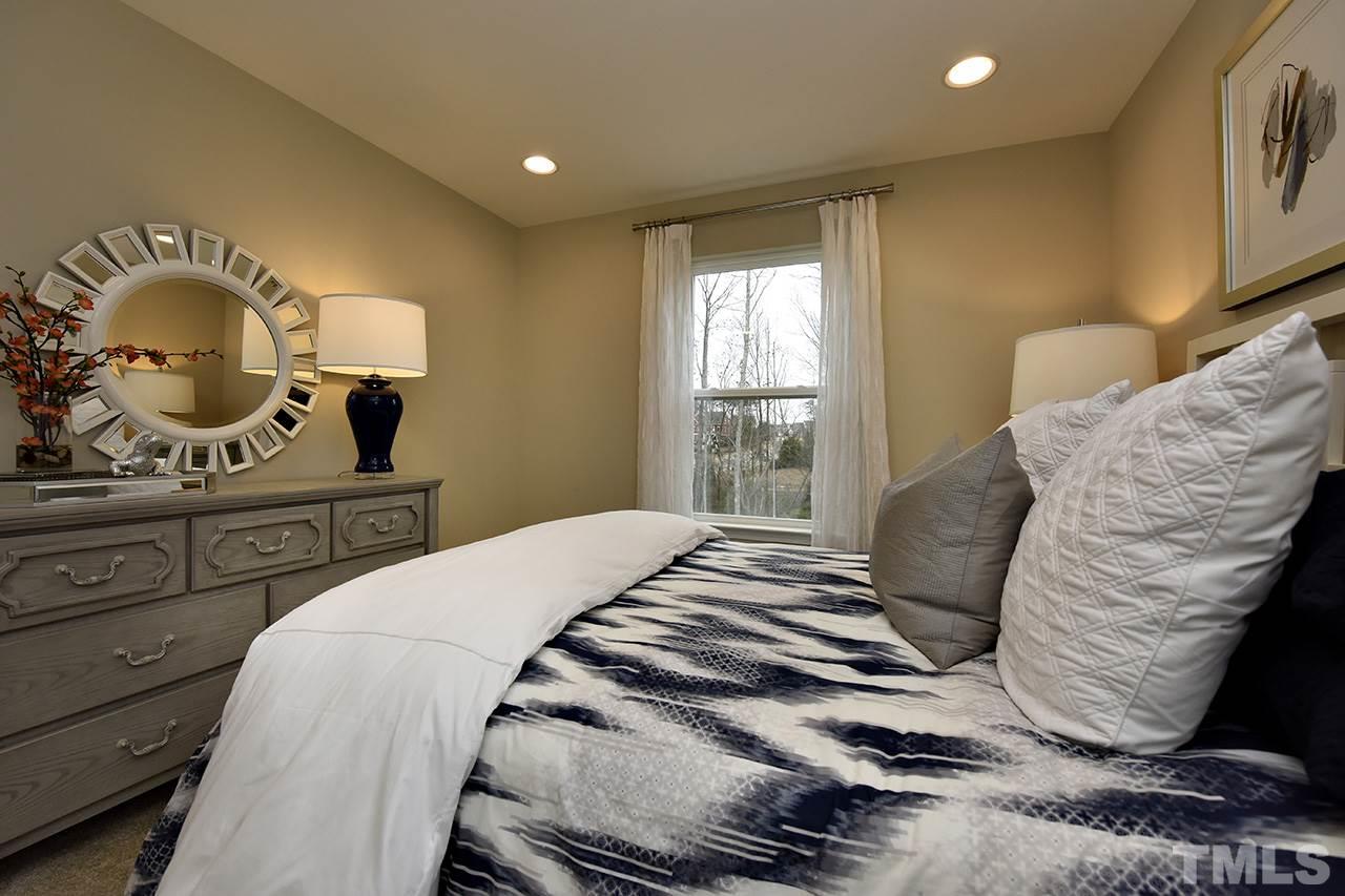 2567 Rambling Creek Road, Unit HOMESITE 14 Apex, NC 27523 - Photo 17 of 19 Photo is of Decorated Model Home at Woodcreek.