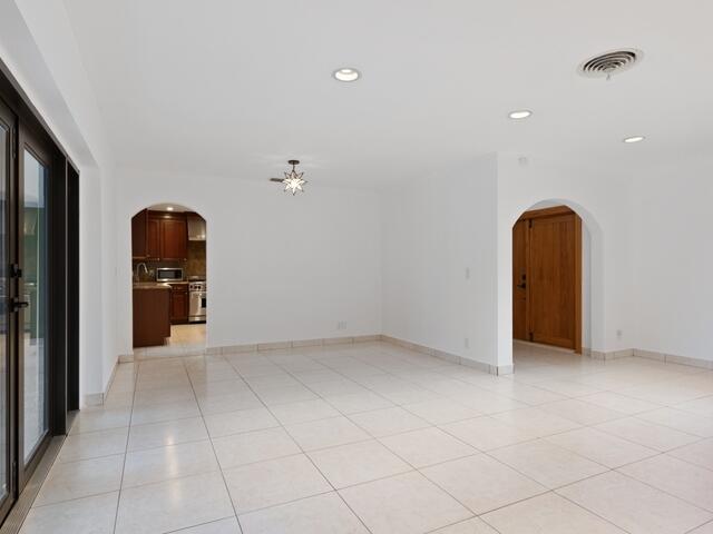1705 Ashby Road Juno Beach, FL 33408 - Photo 5 of 21 wooden floor in a room with a window