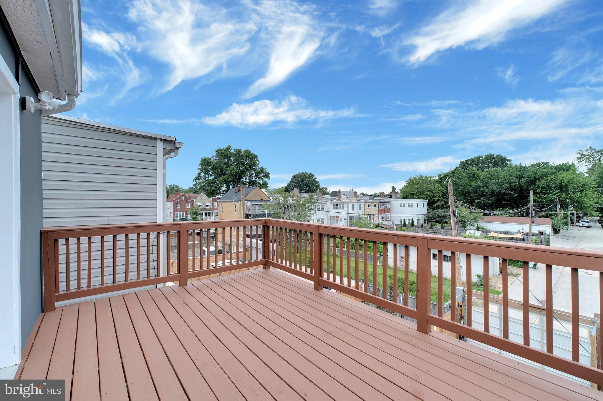 5318 5th Street Northwest Washington, DC 20011 - Photo 16 of 40 a view of deck with wooden floor and fence
