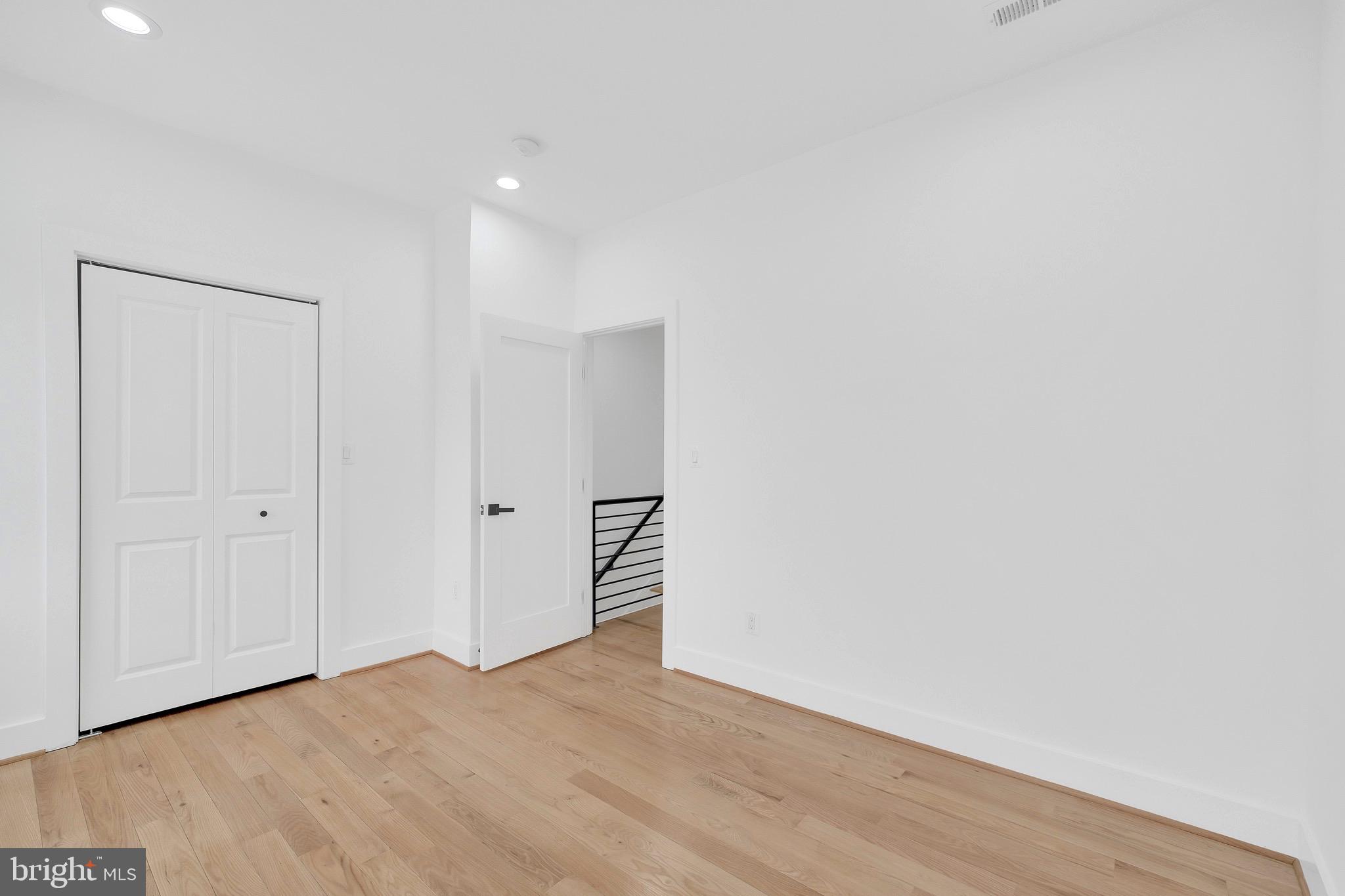 5318 5th Street Northwest Washington, DC 20011 - Photo 24 of 40 a view of an empty room with wooden floor