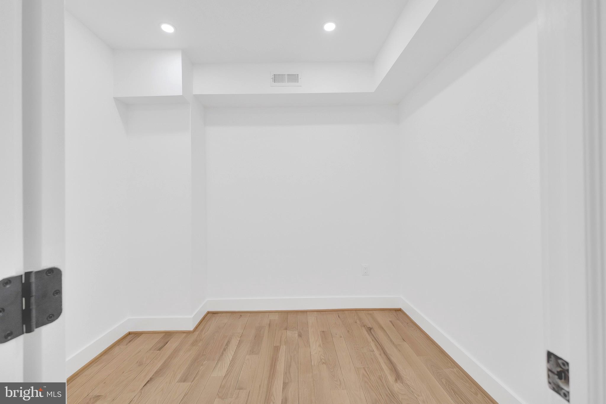 5318 5th Street Northwest Washington, DC 20011 - Photo 25 of 40 a view of a room with wooden floor and fan