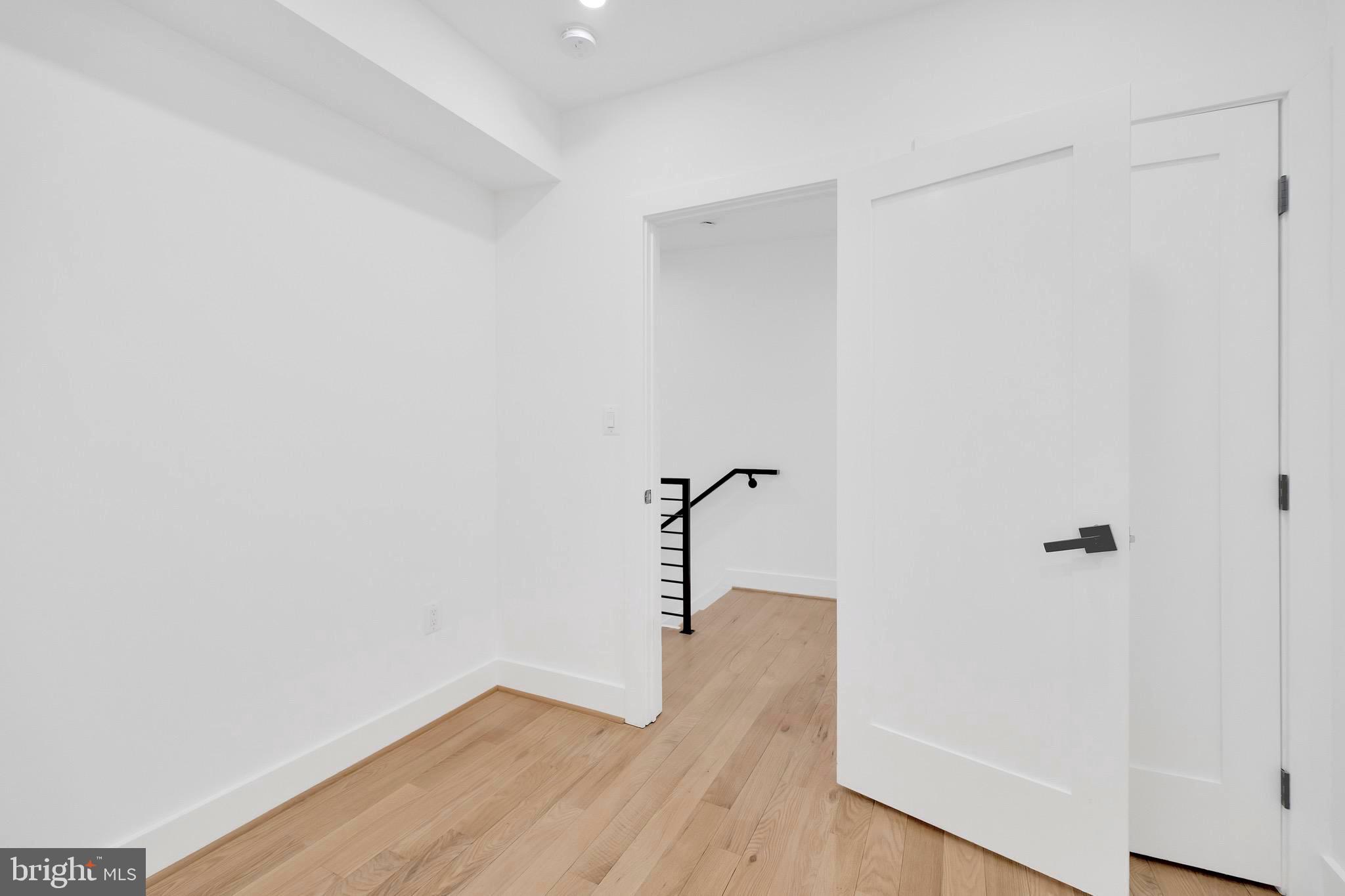 5318 5th Street Northwest Washington, DC 20011 - Photo 26 of 40 a view of a hallway with wooden floor